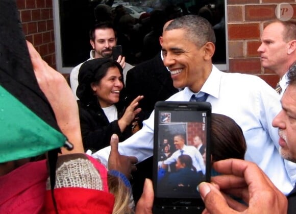 Barack Obama a distribué des sourires à Alexandria en Virginie en compagnie de son chien Bo. Le 21 décembre 2011