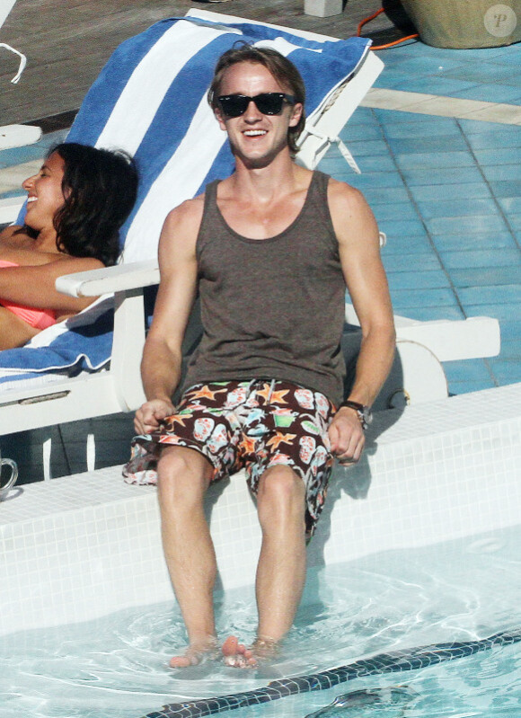Tom Felton, au bord d'une piscine à Miami (Floride), le vendredi 30 décembre 2011.