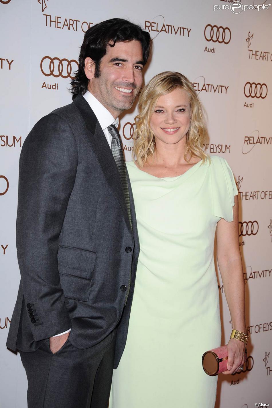 Amy Smart et Carter Oosterhouse lors de l'Art of Elysium Heaven Gala ...