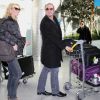Alexandra Lamy et Jean Dujardin à l'aéroport de Roissy-Charles-de-Gaulle, revenant de Los Angeles, le 17 janvier 2012