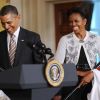 Barack Obama et sa femme Michelle le 17 janvier 2012 lors d'une cérémonie rendant hommage aux Cardinals de Saint-Louis à la Maison Blanche à Washington