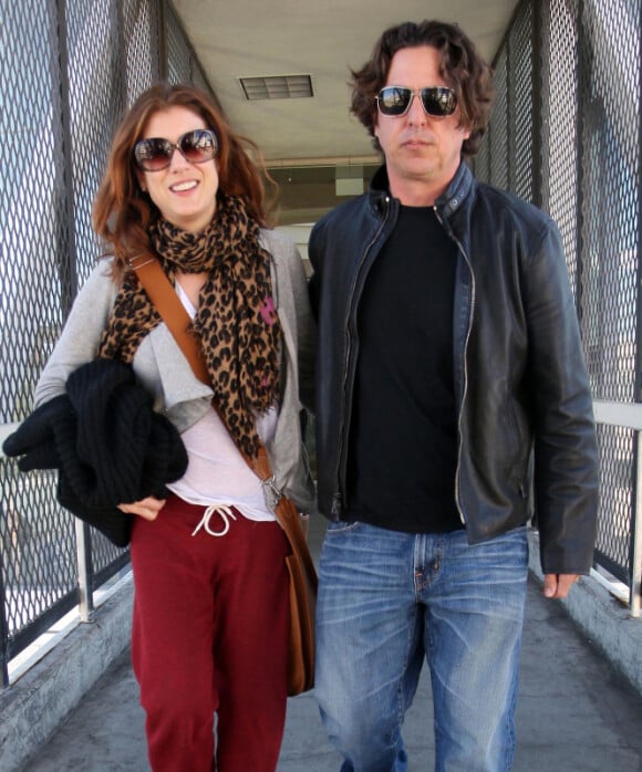 Kate Walsh et son amoureux Chris Case, à l'aéroport de Los Angeles, le 4 février 2012