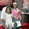 Whitney Houston, Bobby Brown et leur fille, en août 2004.