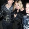 Kate Moss et Jamie Hince à la sortie d'un club de Londres le 22 février 2012