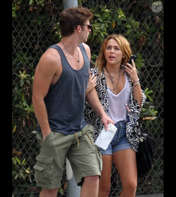Miley Cyrus et Liam Hemsworth, en août 2011 à Los Angeles.