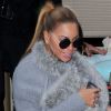 Beyoncé et sa fille Blue Ivy, emmaillotée dans une écharpe en fourrure, forment un adorable duo à New York, le 27 mars 2012.