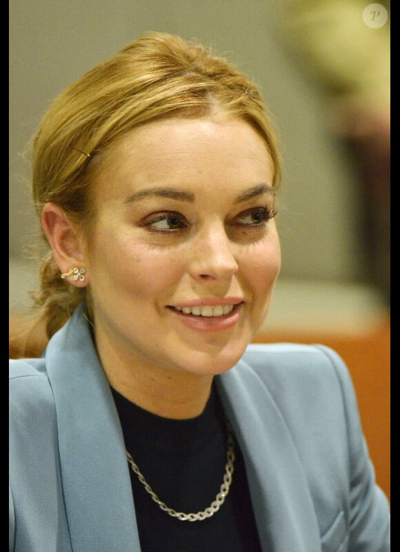 La vie sourit enfin à Lindsay Lohan, libérée de toute comparution devant la Cour supérieure de Los Angeles, le 29 mars 2012.