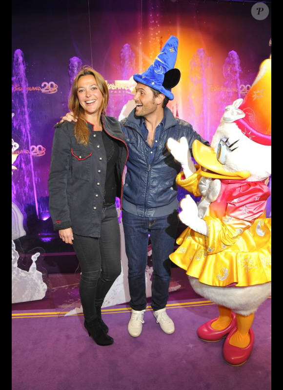 Sandrine Quétier et Christophe Beaugrand à Disneyland Paris pour les 20 ans du parc à thème, le samedi 31 mars 2012.