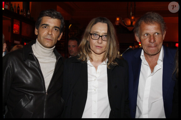 Xavier de Moulin, Virginie Despentes et Patrick Poivre d'Arvor lors de la soirée de la Closerie des Lilas à l'occasion de la remise du prix littéraire du même nom le 3 avril 2012 à Paris