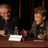 Johnny Hallyday et son producteur Gilbert Coullier lors d'une conférence de presse annonçant la tournée, à la tour Eiffel, le 3 décembre 2011.