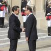 Nicolas Sarkozy et François Hollande lors de son investiture, le 15 mai 2012, à Paris.