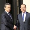 Nicolas Sarkozy, et François Hollande lors de son investiture, le 15 mai 2012, à Paris.