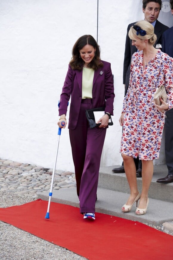 Carina Axelsson, compagne du prince Gustav de Sayn-Berleburg-Wittgenstein, marraine de la princesse Athena. Baptême de la princesse Athena Marguerite Françoise Marie de Danemark, le 20 mai 2012 en l'église de Møgeltønder.