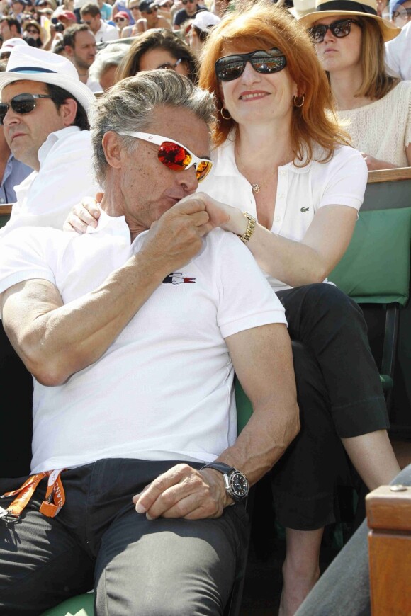 Gérard Holtz et sa compagne Murielle Mayette  à Roland-Garros, le 28 mai 2012.