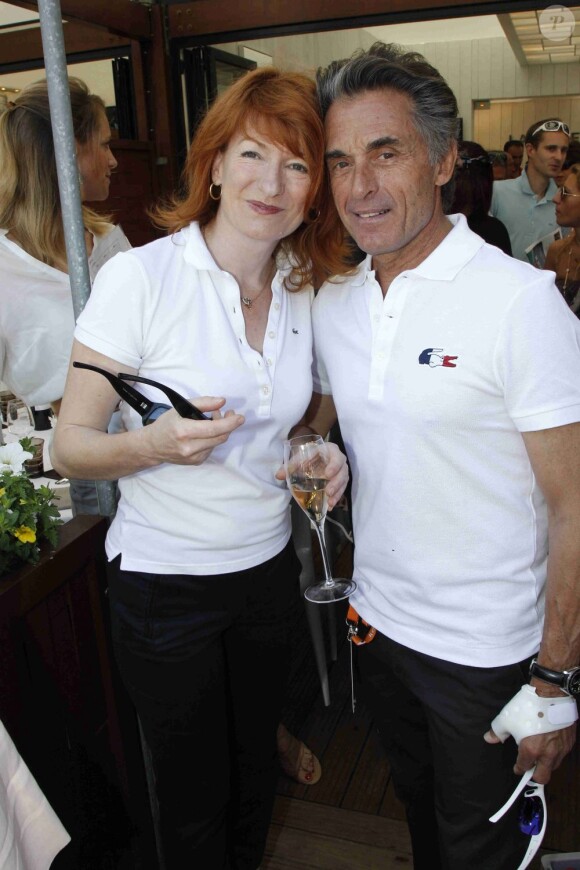 Gérard Holtz et sa compagne Murielle Mayette  à Roland-Garros, le 28 mai 2012.