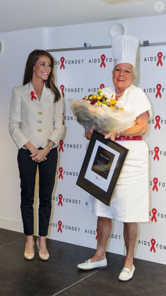 La princesse Marie de Danemark remettait le 1er juin 2012 à Ida Davidsen, qu'elle connaît par le biais de son assistante personnelle, l'un des quatre prix de la AIDS Foundation Denmark, dont elle est la marraine.