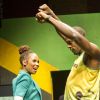 Usain Bolt et Cedella Marley esquissent quelques pas de danse le 1er juin à Londres lors du défilé présentant les tenues des athlètes jamaïcains.