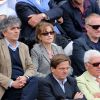 Isabelle Huppert avec son compagnon. Les people étaient nombreux au rendez-vous de la finale féminine de Roland-Garros, samedi 9 juin 2012, pour assister au premier sacre à Paris de Maria Sharapova.