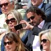 Henri Leconte et sa femme Florentine. Les people étaient nombreux au rendez-vous de la finale féminine de Roland-Garros, samedi 9 juin 2012, pour assister au premier sacre à Paris de Maria Sharapova.