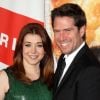 Alyson Hannigan et Alexis Denisof posent en mars 2012 lors d'une avant première à Los Angeles