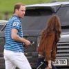 Kate Middleton, duchesse de Cambridge, assiste avec son chien Lupo à un match caritatif de polo auquel les princes William et Harry participent, à Westonbirt, le 17 juin 2012. Kate félicite son mari le prince William