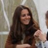 Kate Middleton, duchesse de Cambridge, assiste avec son chien Lupo à un match caritatif de polo auquel les princes William et Harry participent, à Westonbirt, le 17 juin 2012