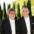 Elton John et David Furnish lors du 14e White Tie and Tiara Ball, organisé par leurs soins et Chopard, à Old Windsor, le 28 juin 2012.
