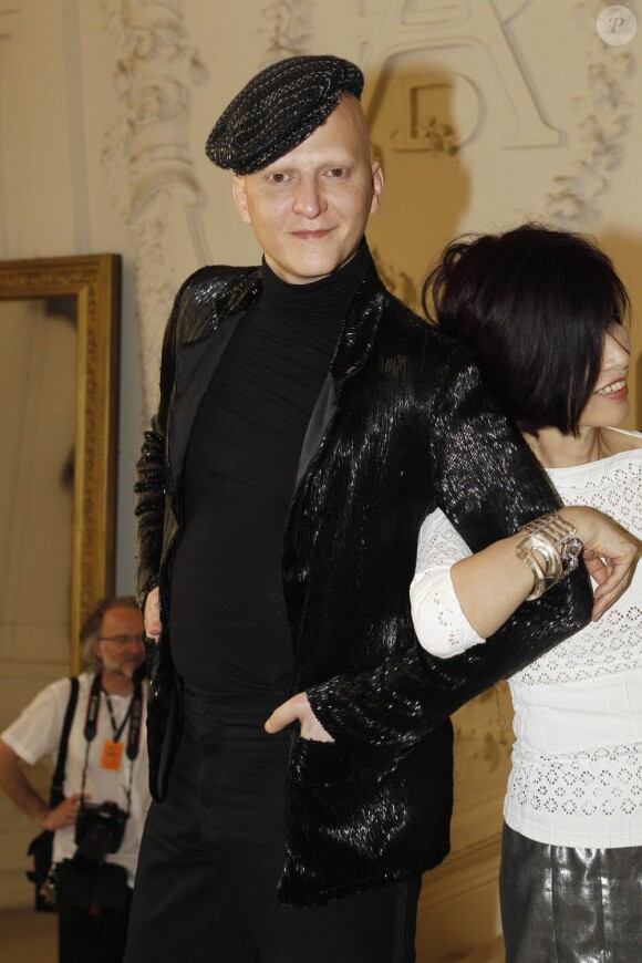 Le photographe Ali Madhavi au défilé haute couture de Jean Paul Gaultier. Paris, le 4 juillet 2012.