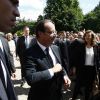 François Hollande et Valérie Trierweiler dans les jardins de l'Elysée le 14 juillet 2012, le temps d'une brève rencontre avec le public.