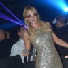 Paris Hilton joue les DJ au Palais Club de Cannes, le 23 juillet 2012.