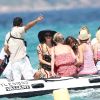 A bord d'un bateau pneumatique, Paris Hilton rejoint un yacht pour y passer la journée, à St-Tropez, le samedi 28 juillet 2012.