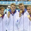 Amaury Leveaux, Fabien Gilot, Clément Lefert et Yannick Agnel après avoir obtenu la médaille d'or lors du relais 4x100m le 29 juillet 2012 lors des Jeux olympiques de Londres