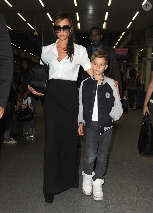 Victoria Beckham et son fils Romeo à Paris en juillet 2012