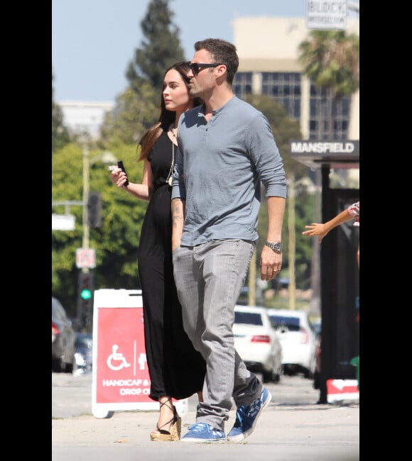 Megan Fox, enceinte, et Brian Austin Green se rendent à la messe avec le fils de l'acteur, Kassius, à Los Angeles, le 15 juillet 2012