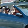 Connor et Isabella Cruise, les enfants adoptifs de Tom Cruise et Nicole Kidman, rendent visite à de la famille en Californie, à bord d'une belle décapotable, le 7 août 2012