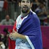Nikola Karabatic porte haut les couleurs de la France. Les Experts du hand français ont conservé le 12 août 2012 aux JO de Londres leur titre olympique de Pékin en battant en finale la Suède (22-21). Un doublé historique, une joie épique, une équipe de légende.