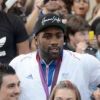 Teddy Riner sur les Champs-Elysées, quelques heures après son retour des Jeux Olympiques 2012 de Londres, le lundi 13 août 2012.