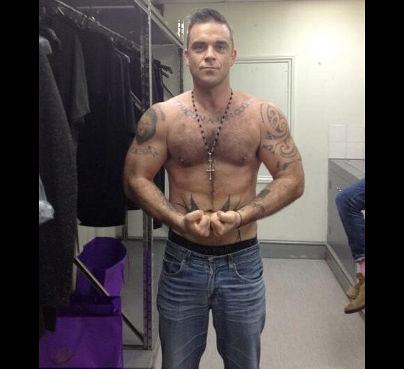 Robbie Williams très affûté en août 2012, prêt à devenir un super papa !