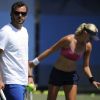 Kristina Mladenovic et son coach Thierry Ascione à l'USTA Billie Jean King National Tennis Center à New York City le 30 août 2012