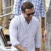 Ryan Reynolds suit sa petite amie Blake Lively lors de l'arrivée du couple à Venise. Le 30 août 2012.