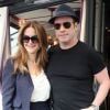 John Travolta et Kelly Preston sortent du restaurant L'avenue, à Paris, le 10 septembre 2012