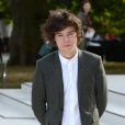 Harry Styles du groupe One Direction à son arrivée à Kensington Gardens pour le défilé Burberry Prorsum printemps-été 2013. Londres, le 17 septembre 2012.