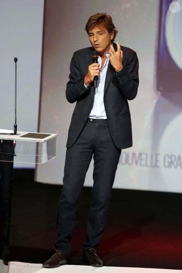 Guy Lagache lors de la conférence de presse de lancement de la chaîne D8, au carrousel du Louvre, le 20 septembre 2012