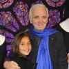 Charles Aznavour et sa petite-fille à la première de Sister Act au Théâtre Mogador, à Paris, le 20 septembre 2012.