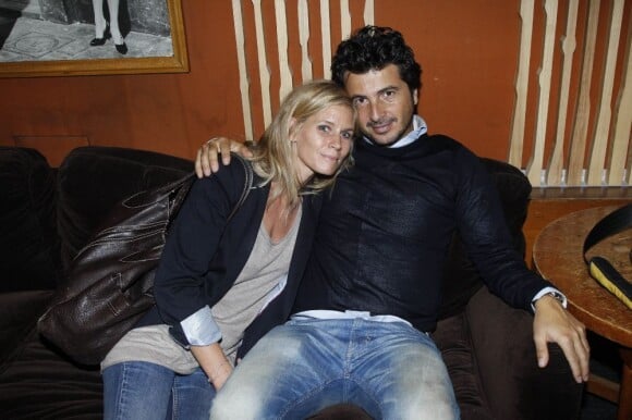 Sarah Lelouch et son fiancé David Marouani à la soirée où Arlette Gordon a été décorée, au club 13 à Paris le 23 septembre.