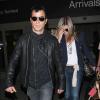 Jennifer Aniston et Justin Theroux arrivent à l'aéroport de Los Angeles au mois de juin 2012.