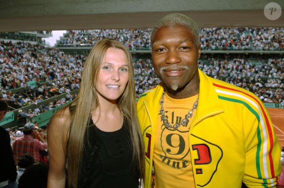 Djibril Cisse et sa femme Jude à Roland-Garros le 3 juin 2006 à Paris