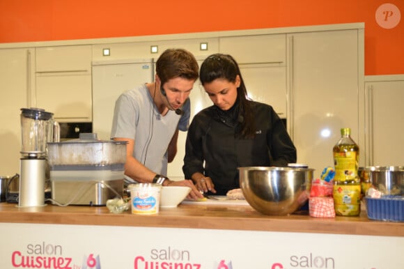 Grégory Cuilleron et Tabata de Top Chef 2012 lors de la deuxième édition du Salon Cuisinez à la Porte de Versailles le 19 octobre 2012