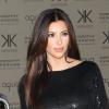 Kim Kardashian, ultrasexy dans une robe à sequins et des sandales Tom Ford, célèbre le lancement de la nouvelle Kardashian Kollection à l'Aqua. Londres, le 8 novembre 2012.