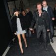 Johnny Hallyday et la belle Laeticia quittent la soirée Chanel pour l'exposition  La Petite Veste Noire  au Grand Palais, le 8 novembre 2012 à Paris.